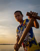 Boy-Tonle-Sap-Lake-Cambodia-sunrise